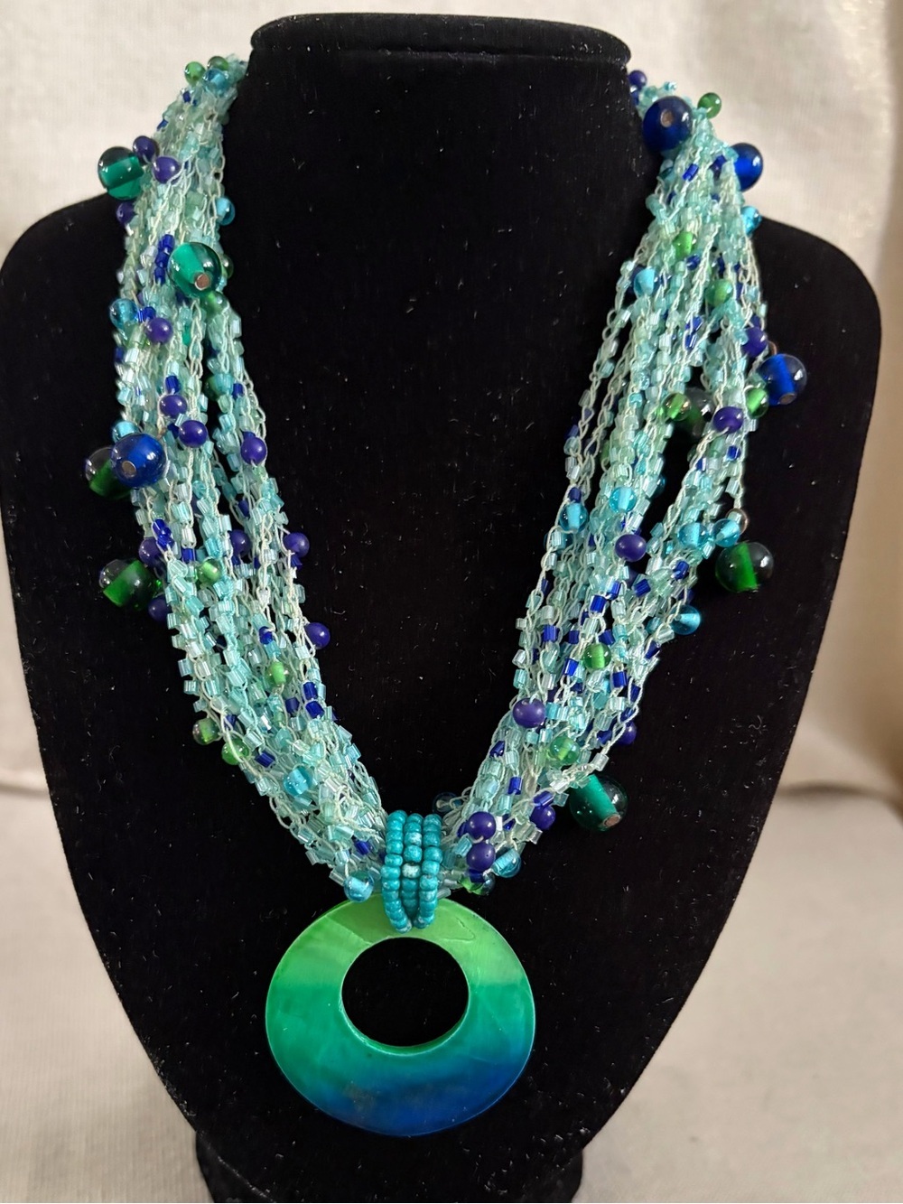 Multi-Strand Aqua & Green Beaded Necklace with Circular Pendant